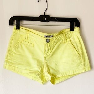Express neon yellow mini shorts
